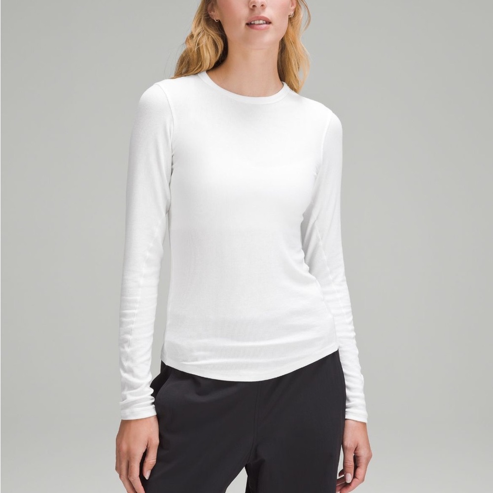 Lululemon hold tight long sleeve - white size 6 has small spots** on it